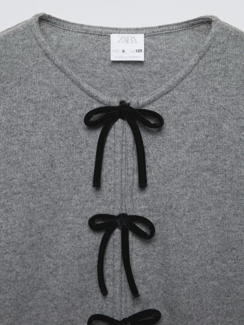 Jersey gris con lazos niña